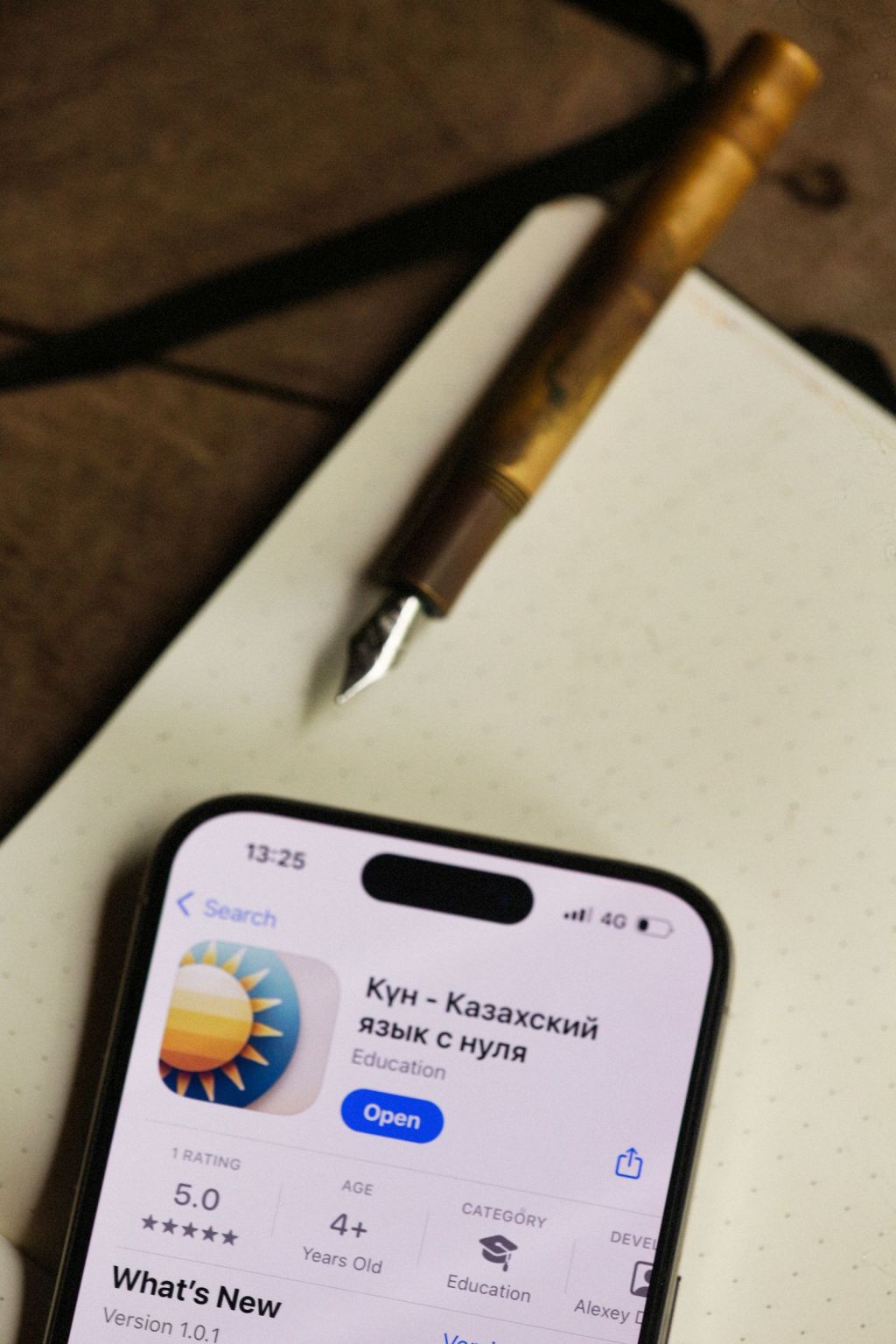 modern learning app display with fountain pen