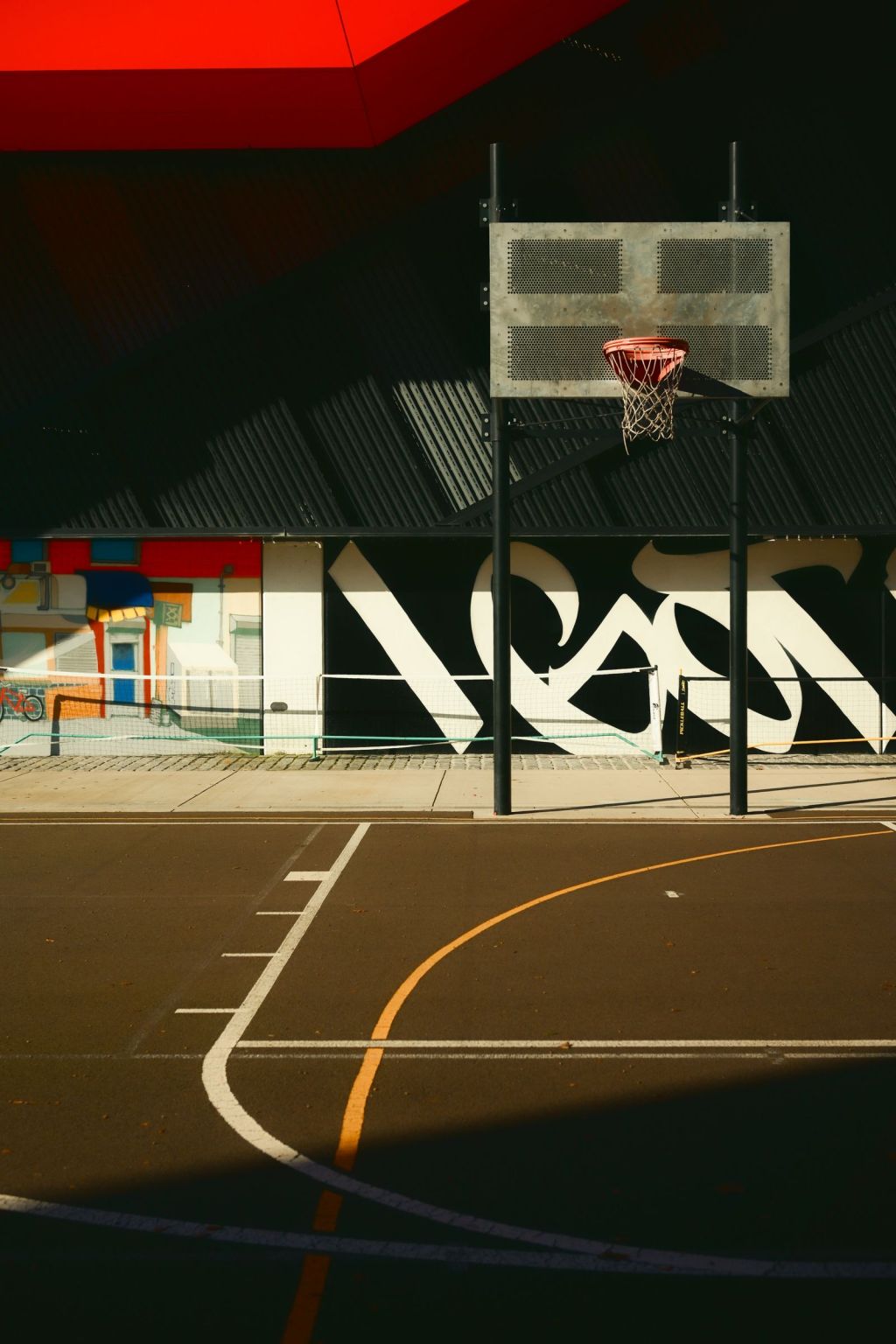urban basketball court with graffiti art decor